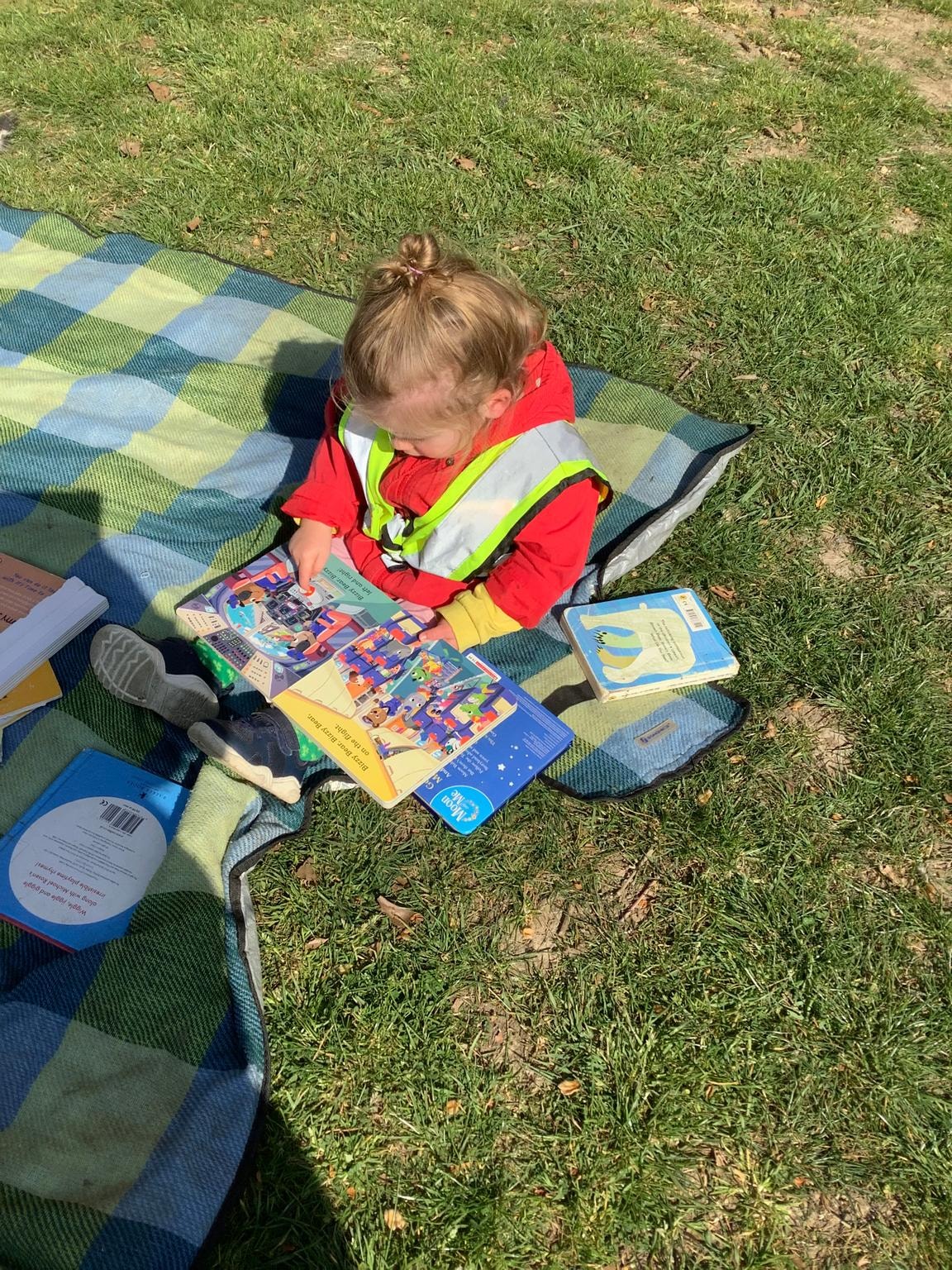 Children gathered for storytime, listening with wide eyes